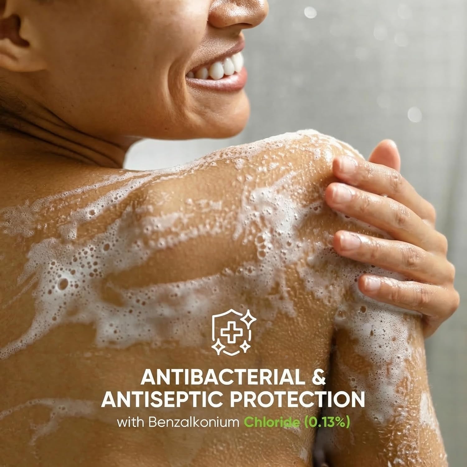Woman lathering Roycederm antibacterial body wash for skin cleansing